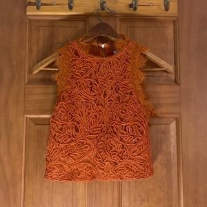 Orange textured see through top